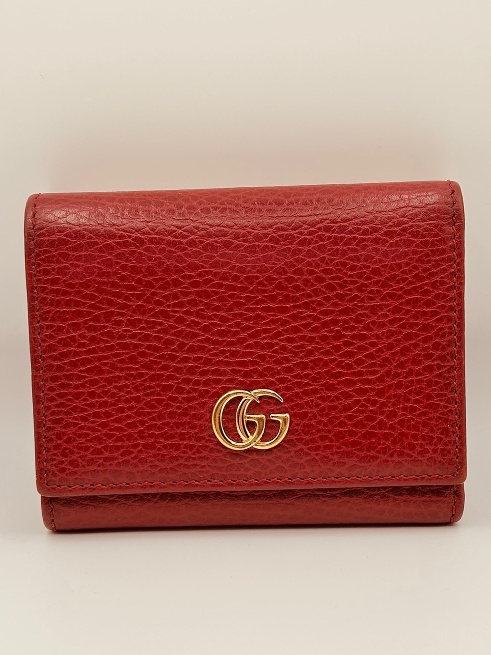 Gucci GG Marmont Tri-fold Red Pebbled Leather Wallet in Very Good Condition